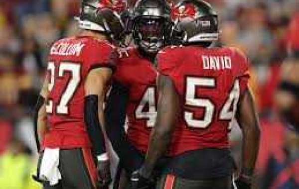 Buccaneers signal very first-rounder Barton, finishing draft study course